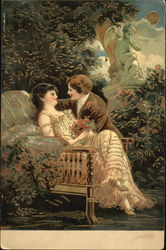 Two lovers sitting in a garden being watched over by a statue of Cupid Postcard