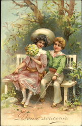 Young girl and boy sitting on a bench Postcard