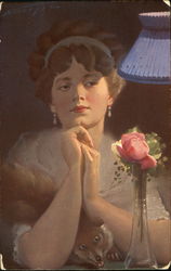 Woman with roses in a vase Postcard