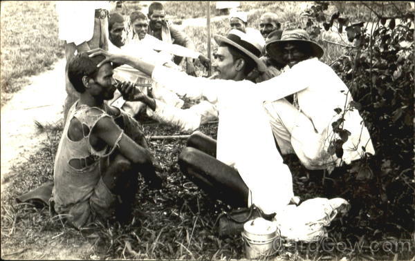 Man shaving his friend Malaya Men