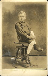 Portrait of Boy sitting on a Stool Portrait of Boy sitting on a Stool