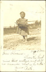Black girl carrying wood Postcard