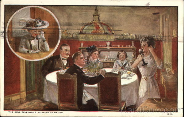 Woman Talking on the Phone at Dinner Time Telephones