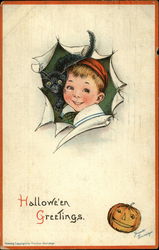 A boy with his black cat Halloween Postcard Postcard