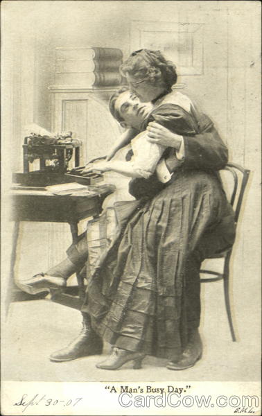 A Man's Busy Day: man and woman at typewriter desk