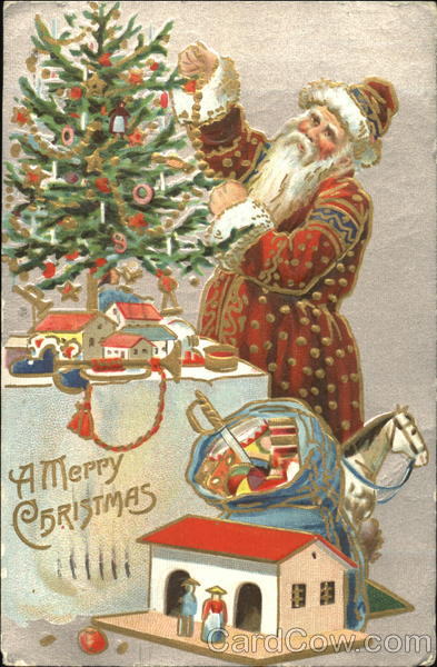 Santa With a Red Robe Decorated With Gold Decorates Tree