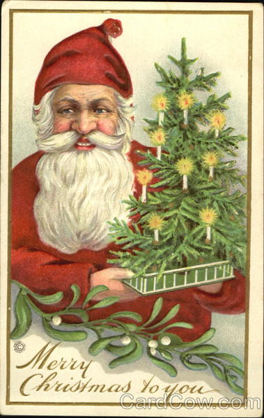 Santa holding miniature Christmas tree Santa Claus
