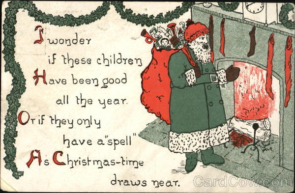 Santa in a green coat infront of a fireplace Santa Claus