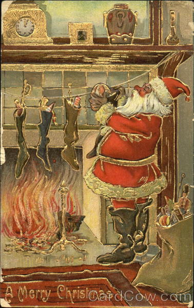 Santa hanging stocking before a fire Santa Claus