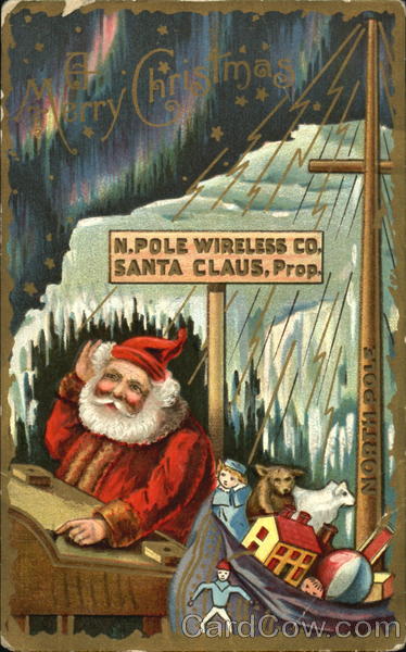 Santa Claus sitting at a desk