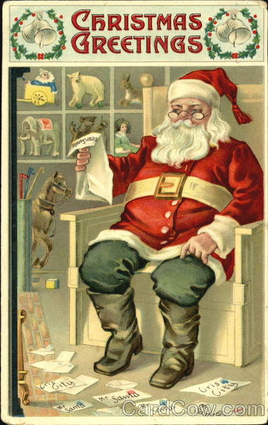 Santa sitting reading letters Santa Claus