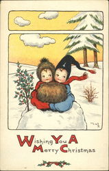 Two children hugging with holly sprig Postcard Postcard
