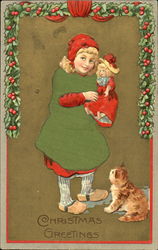 Dutch girl holding doll with kitten Postcard