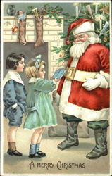 Children giving Santa a gift Postcard