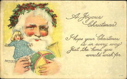 Santa Wearing a Wreath of Holly Holding Toys Postcard