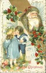 Santa with two children kissing Postcard