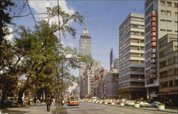 Juarez Avenue during noon traffic Postcard