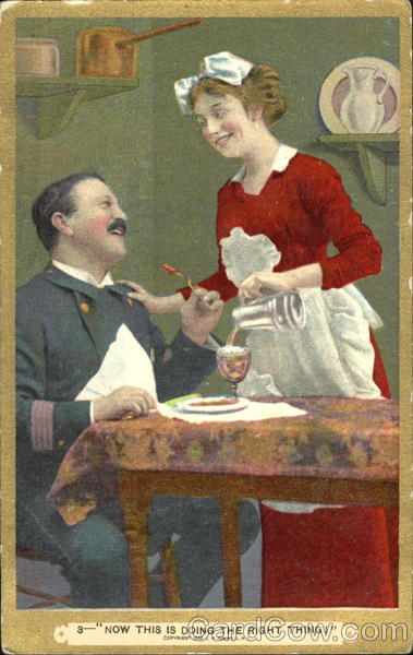 Woman pouring a drink for a man at table Couples
