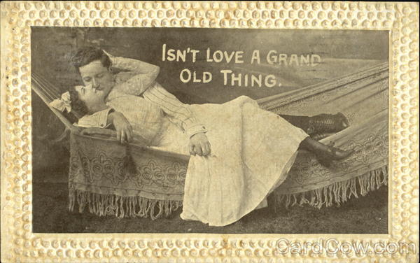 Couple Embracing in Hammock Couples