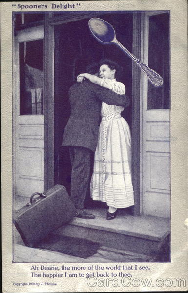 Husband Embracing Wife as Returns Home from Business Trip