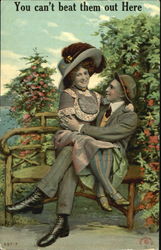 Woman sitting on man's lap on bench Postcard