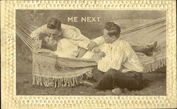 Man Kissing Woman in Hammock next to Seated Man Postcard