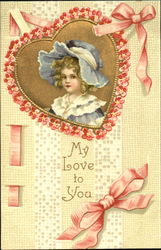 Little girl in blue bonnet framed in a flowered heart Postcard