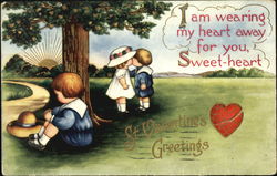 A boy & a girl kissing while another boy sits under a tree Postcard
