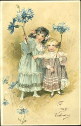 Two small girls holding blue flowers Postcard