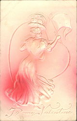 Woman holding flag looking over her shoulder Postcard