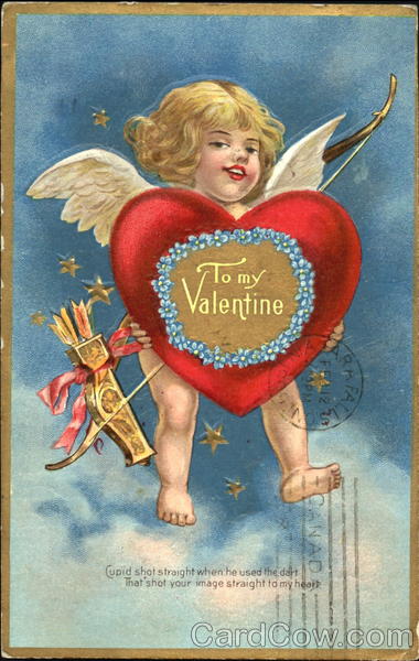 Little Cupid Holding A Large Red Heart