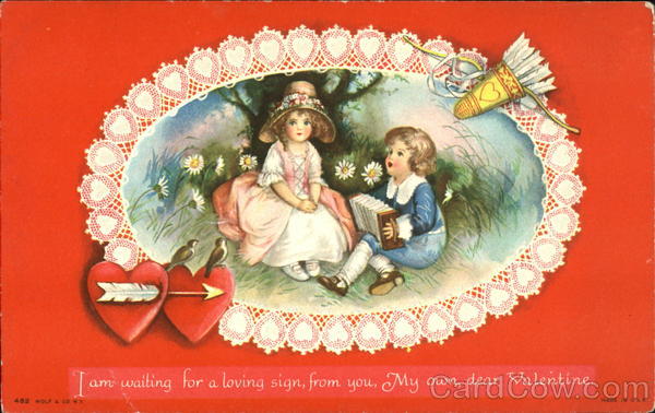 Boy with accordian, girl with straw hat, circled with lacy hearts