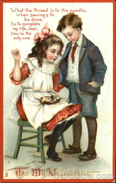 girl sitting on stool sewing button onto boy's shirt
