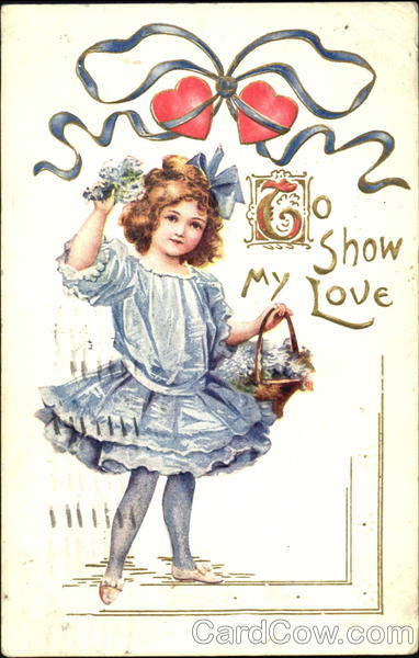 Girl in blue dress, blue ribbons with 2 red hearts