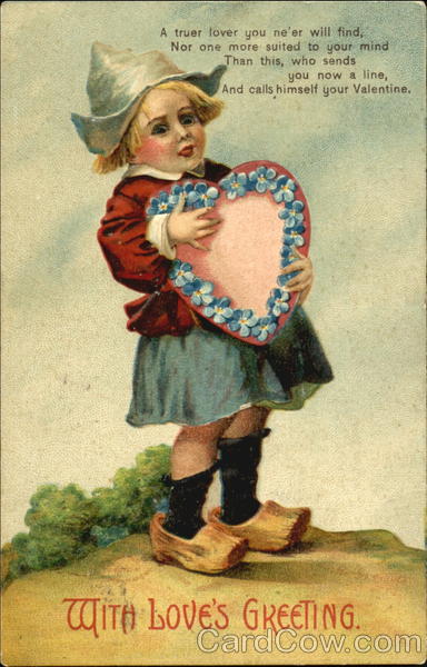 A Dutch boy holding a heart with blue flowers Children