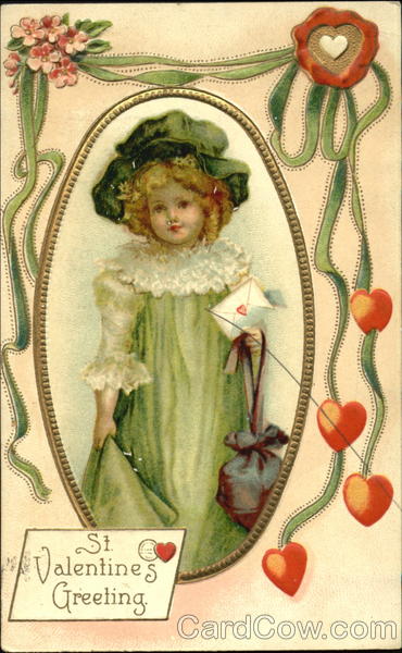 Girl in green frock holding valentine Children
