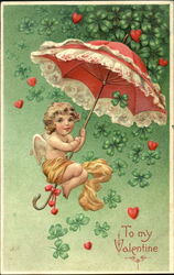 Cupid sitting on an umbrella Postcard Postcard