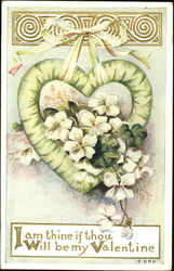 Green heart frame holding white flowers Postcard Postcard