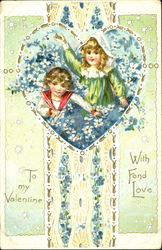 Girl and boy sitting in heart with white and blue flowers Postcard