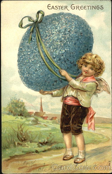 Boy holding big blue egg with green ribbon With Children