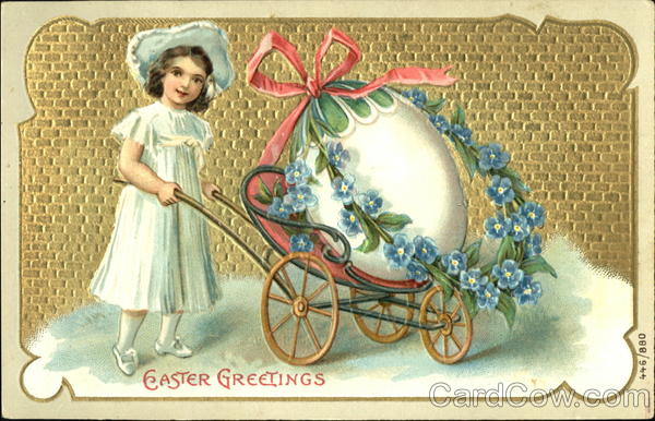 Girl in white dress and hat pushing large decorated egg