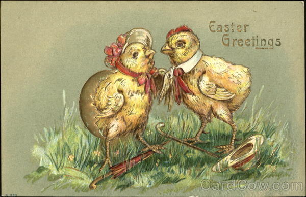 male & female chick, female standing on folded umbrella