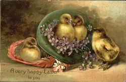 Four chicks with flowers Postcard