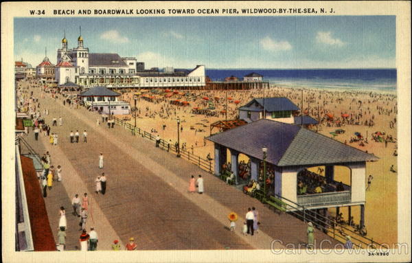 Beach and boardwalk looking toward ocean pier Wildwood-by-the-sea New Jersey