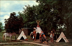 Greetings From Indian Trading Post at Rockome Gardens Postcard