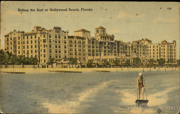 Riding the surf at Hollywood beach Miami Florida