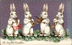 Easter bunnies playing instruments Postcard