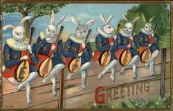 Six Easter Bunnies With Guitars Sit on a Fence Postcard