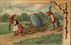 Buuny couple with wheel barrow Postcard