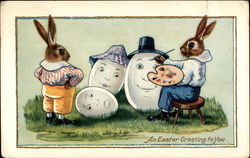 Bunny Paints Funny Faces on Eggs With Bunnies Postcard Postcard